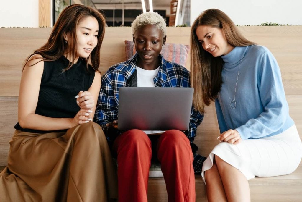 Three colleagues in a meeting.