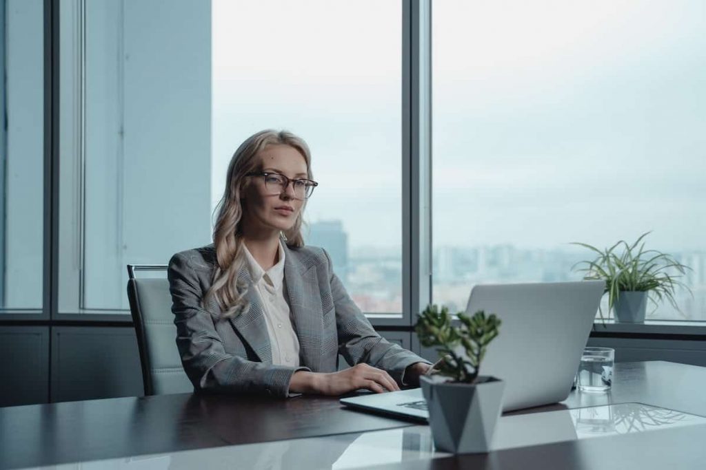 A woman sitting at a desk.