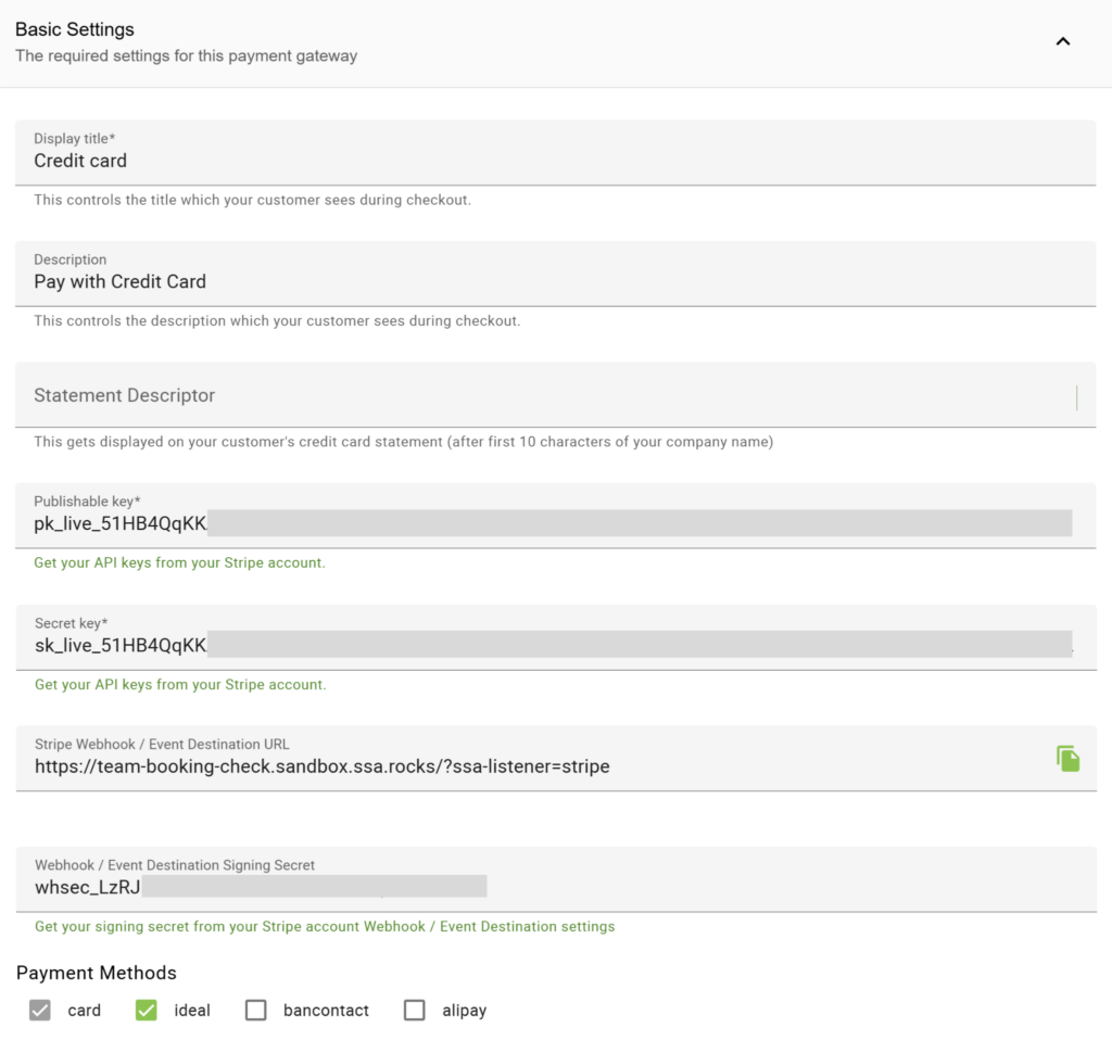 Stripe settings showing publishable keys and webhooks entered in.
